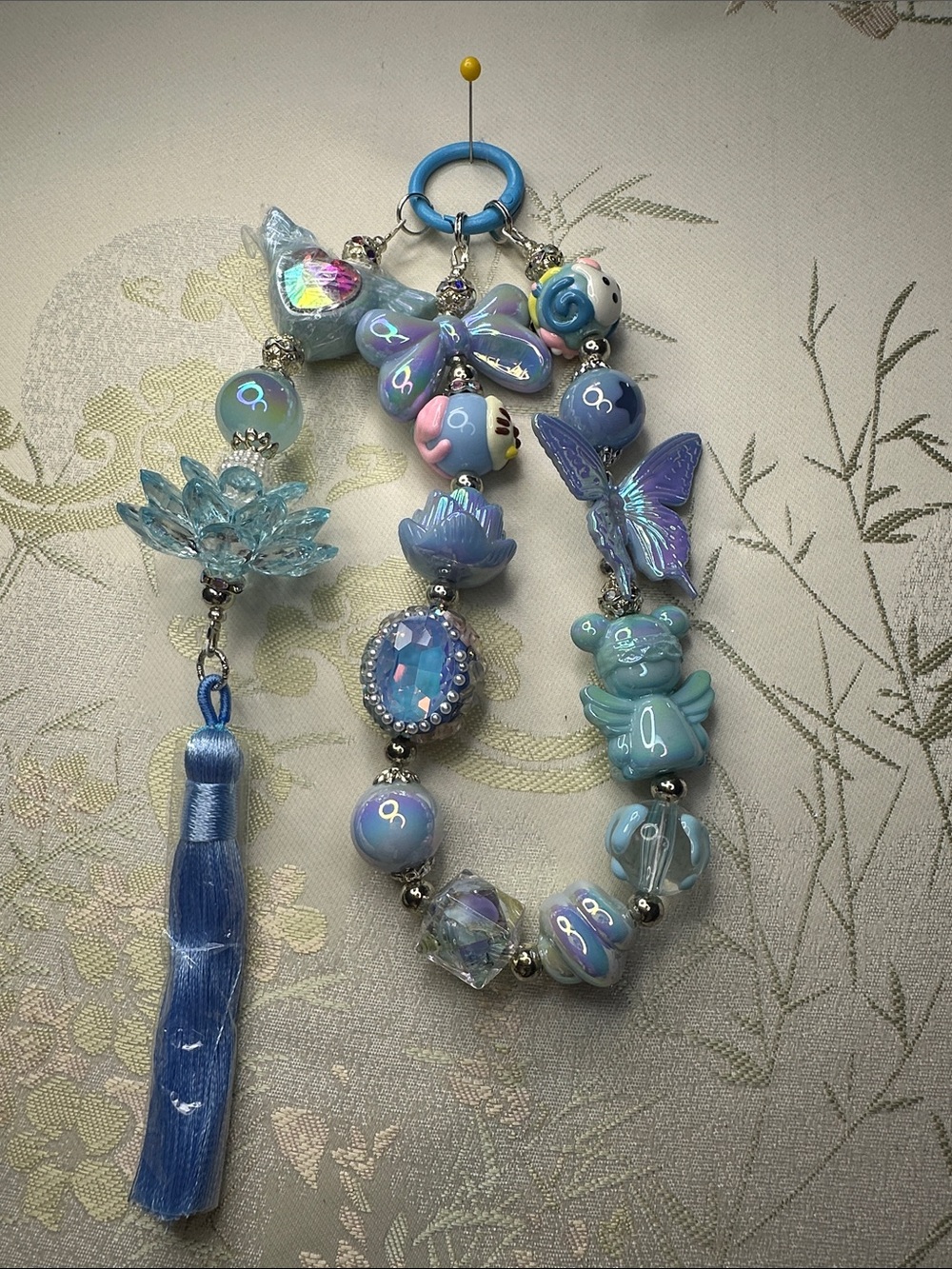 Light bluebeaded phone,keychain,handbag decoration,and  car pendant with Tassel